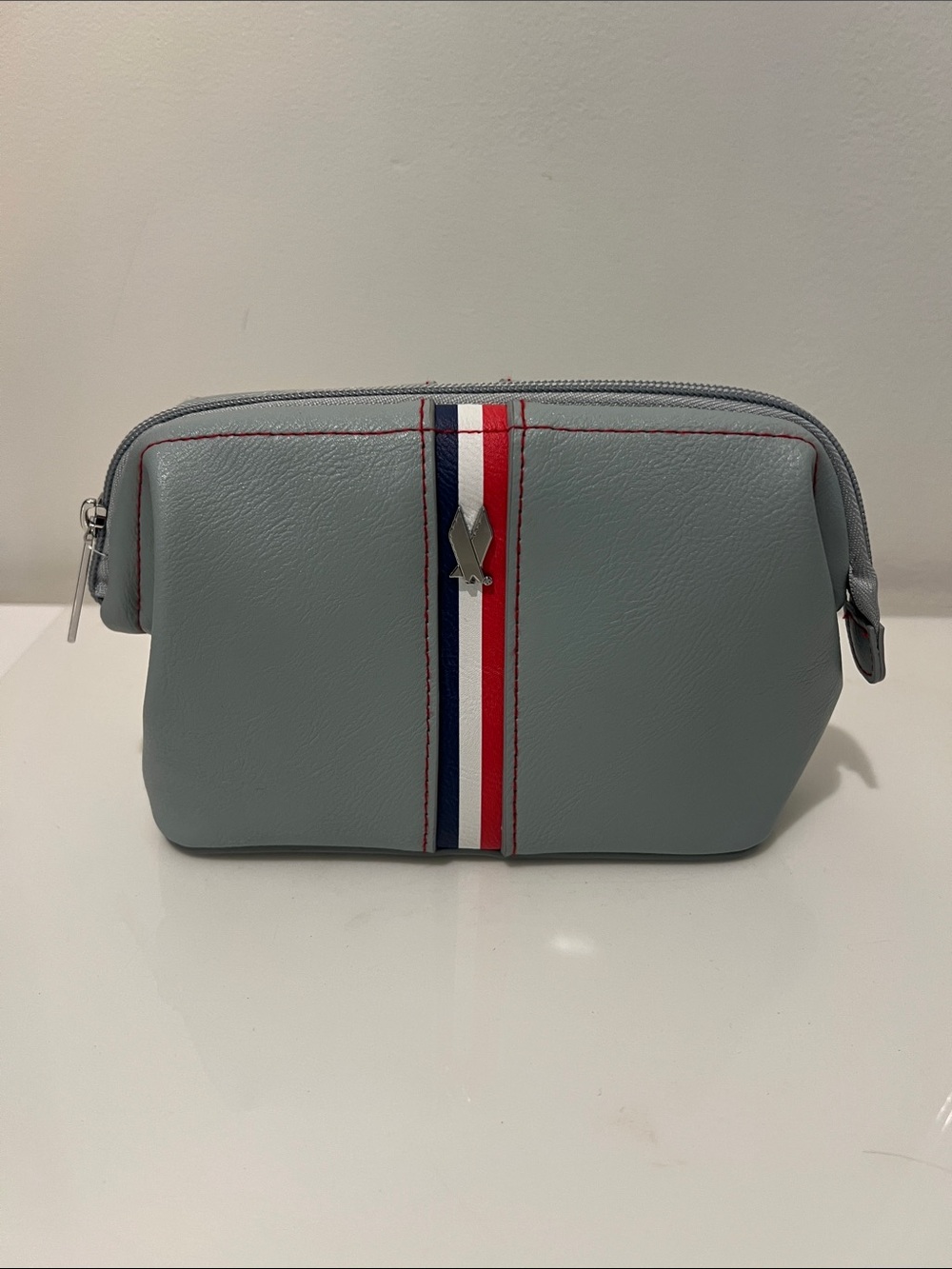 American Airlines 100th Anniversary Amenity Kit Bag Grey Red Blue